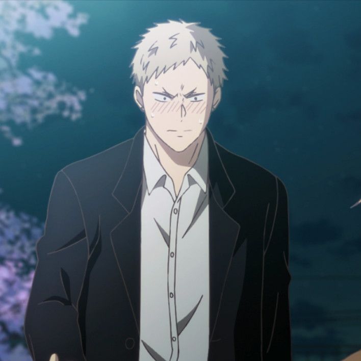 this is an anime image of a man with blond hair wearing a black suit and a white shirt. the man is looking straight forward with a serious expression on his face. he has his hair in a simple style and is blushing. the background is a blurry light blue with green accents.