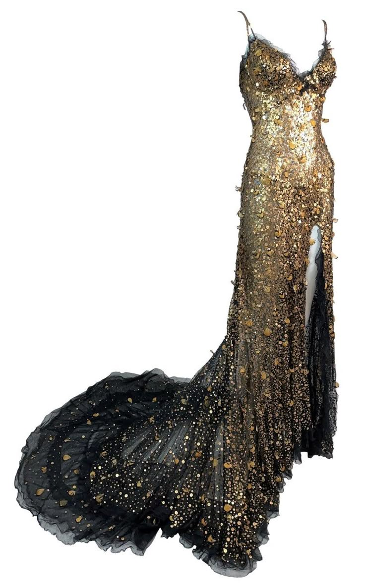 a full shot of a black and gold embellished sequined evening gown with spaghetti straps, a slit on the side, and a long train.