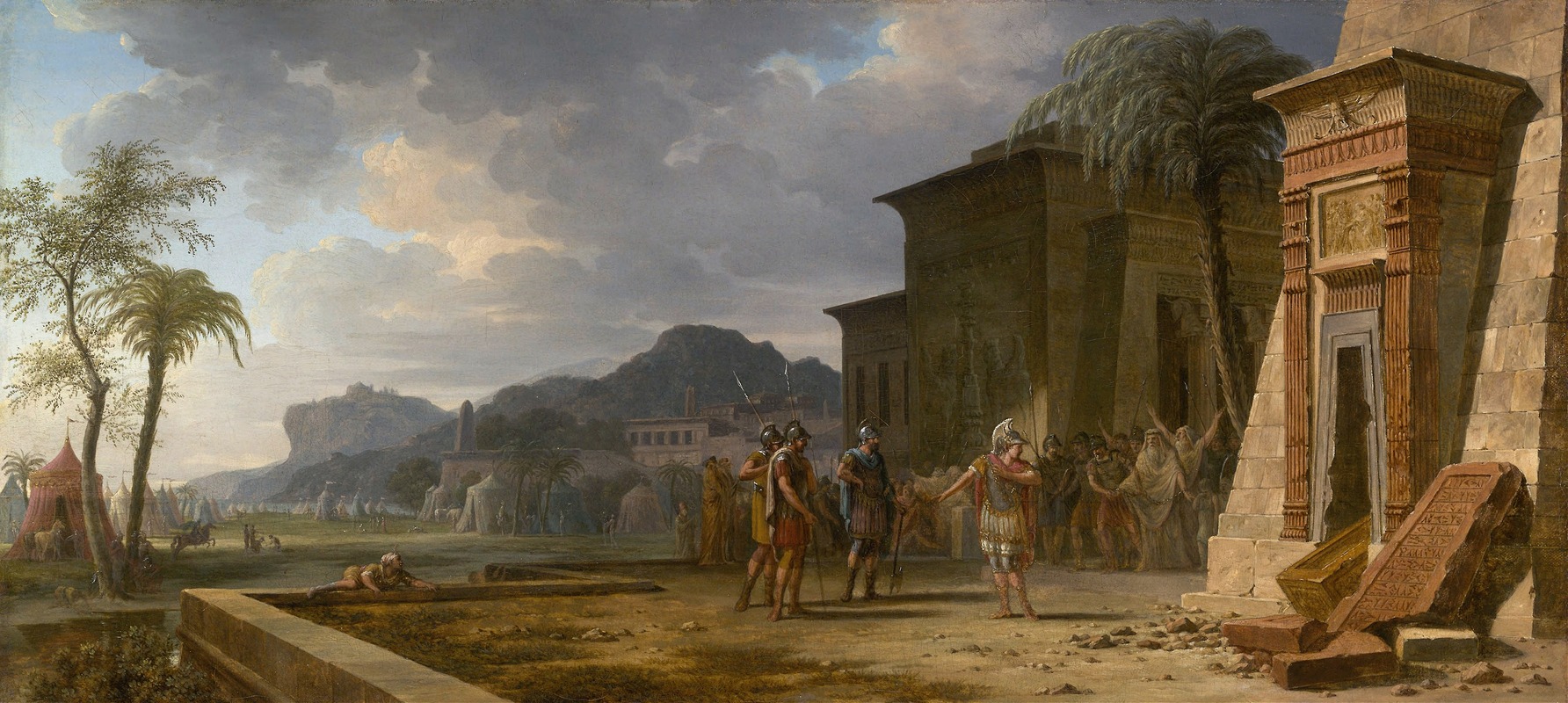 the image is a history painting depicting alexander the great in egypt, likely encountering an egyptian temple. the scene includes alexander, adorned in armor, being greeted by a procession of people outside the temple. soldiers are present, and the landscape includes ruins, a partially ruined temple, palm trees, mountains, and an encampment in the distance. the sky is filled with clouds, suggesting a somewhat overcast day. the painting captures a moment of historical significance, likely depicting alexander's interaction with the egyptian civilization.