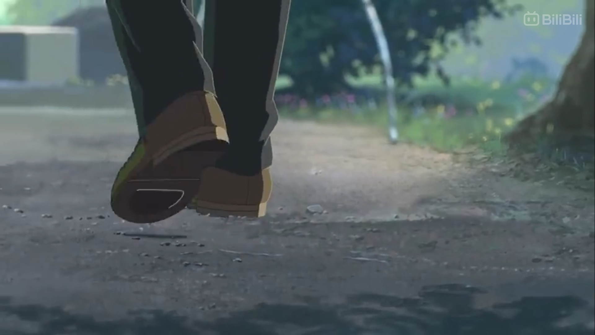 a pair of brown shoes walks away from the camera on a dirt path. the shot is taken from a low angle, following behind the person walking. there is green grass and trees on either side of the path. the lighting is soft, suggesting either morning or evening light.  the overall aesthetic is reminiscent of japanese animation.