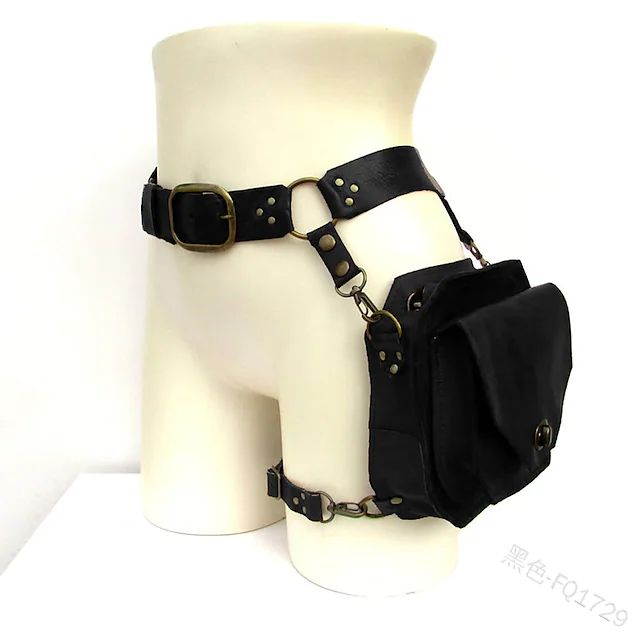 a black leather thigh bag with a steampunk design. it has a belt that goes around the waist and a harness that goes up the leg. the bag is made of canvas and has a flap closure. the bag has a small pocket on the front. the bag is attached to the harness with brass buckles and rings. the bag is worn on a white mannequin.