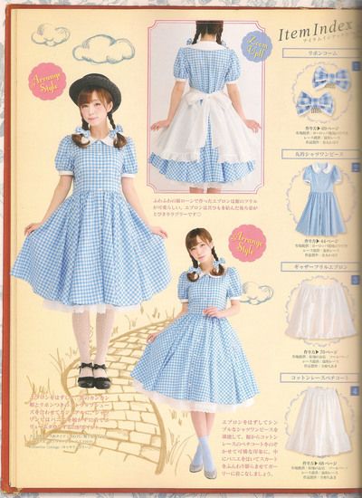 a magazine spread featuring two women modeling blue and white gingham dresses inspired by the wizard of oz. the image includes illustrations of a yellow brick road and clouds. the left page showcases the dresses with text in japanese, while the right page lists the item index with corresponding product photos and details.