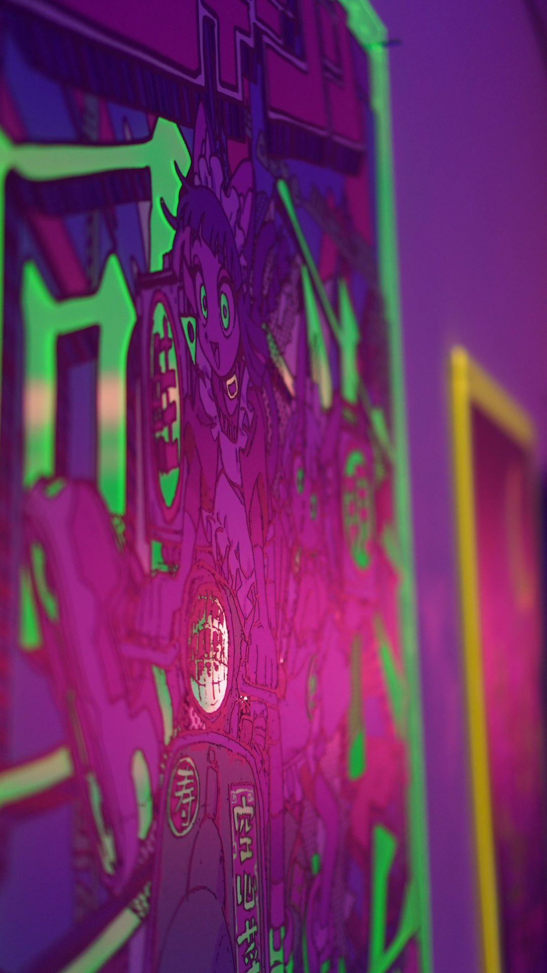 the image showcases a vibrant, closeup view of an animestyle poster illuminated by neon lighting. the artwork features a female character with exaggerated features, typical of certain anime genres. the color palette is dominated by bright purples, pinks, and neon green, creating a visually striking contrast. the poster appears to be displayed in an indoor environment, possibly an art gallery or a room with a similar aesthetic. the overall style evokes elements of cyberpunk, vaporwave, and contemporary digital art trends.