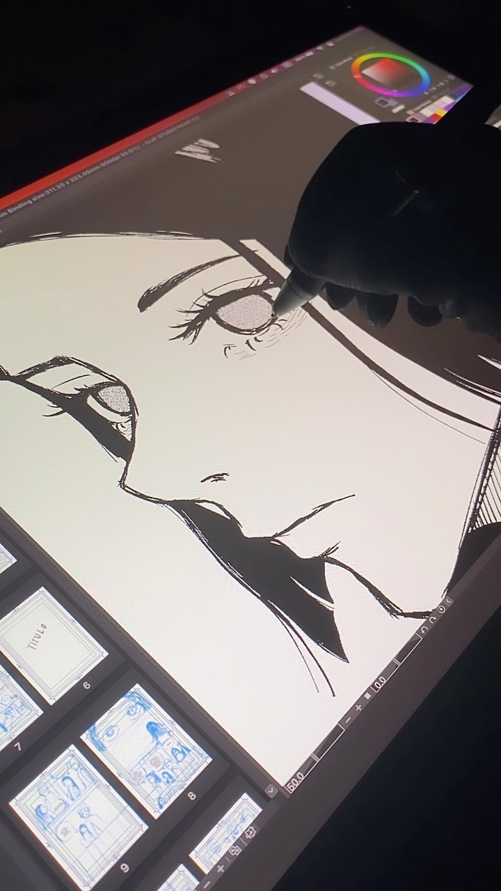 the image shows a closeup view of an artist's hand using a stylus on a graphic tablet.  the screen displays a work in progress: a detailed, stylized anime or mangastyle female face, predominantly inked in black and white.  the artist's hand is partially visible, clad in a dark glove or sleeve. the tablet's screen also shows a color palette and thumbnails of other smaller sketches or elements, suggesting a layered approach to the artwork. the overall impression is one of meticulous digital art creation.