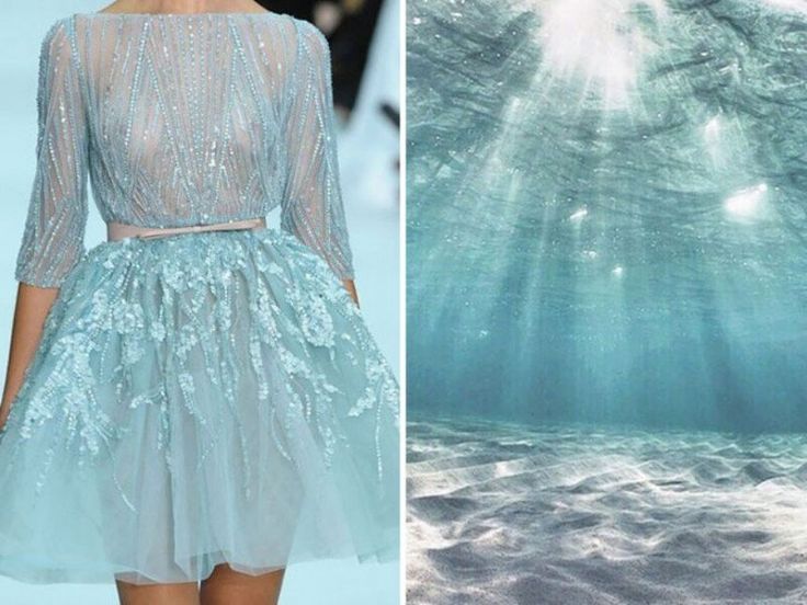 the image shows a model wearing a beautiful blue dress with a shimmering effect. the dress is very detailed and has a lot of sparkle and glitter. the background is a picture of the sea, with light shining through the water. the dress and the sea are both a beautiful shade of blue, and the image creates a sense of elegance and femininity.