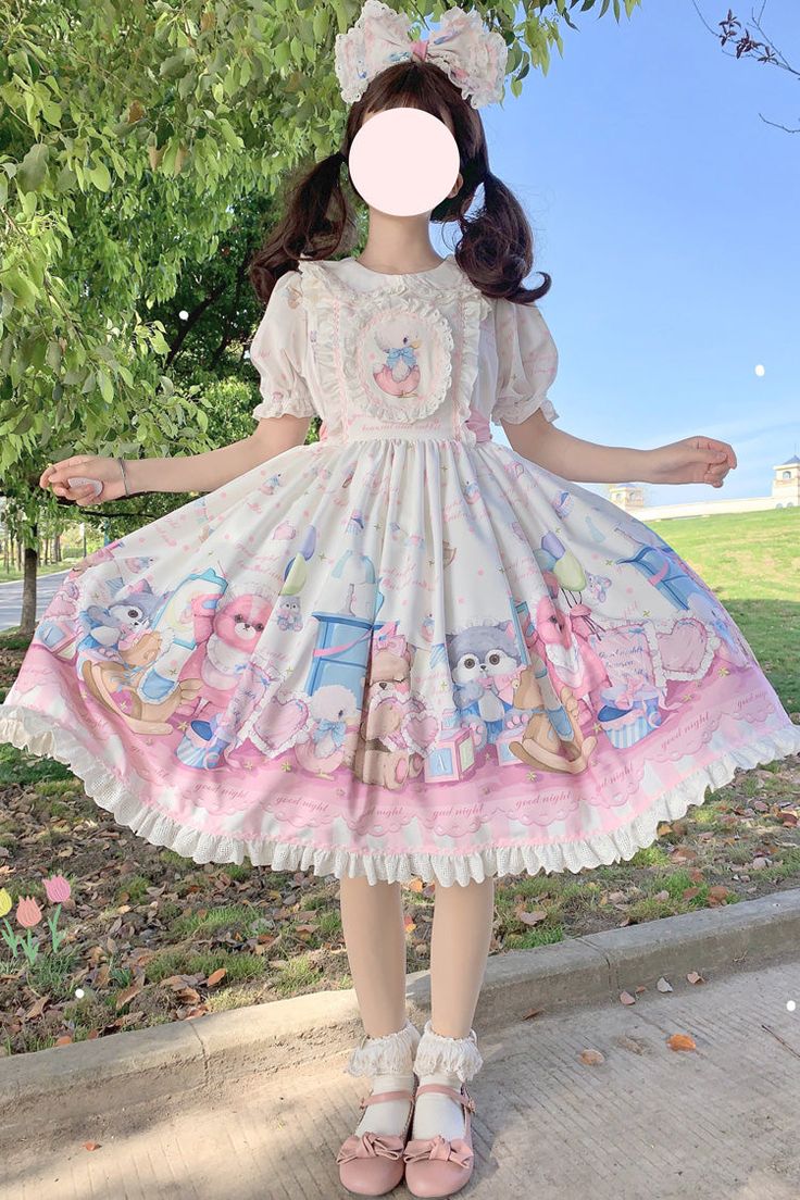 a young woman poses in a park while wearing a white and pink lolita fashion dress. the dress features a print of cute bears, rabbits, and owls. the woman is wearing a large bow in her hair.