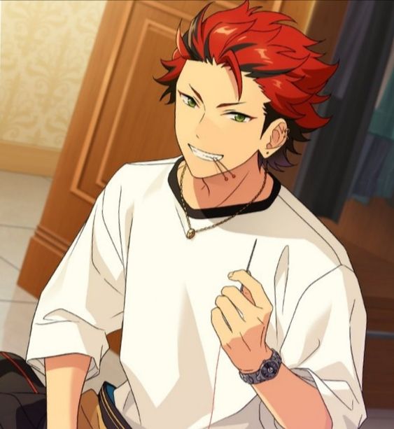 the image shows a portrait of a young man from an anime series. he has spiky red hair with brown undertones and bright green eyes. he is wearing a simple white tshirt, a gold necklace, and has a small, dangling earring in his left ear. he has a sewing needle held between his teeth and is holding a length of red thread in his right hand. he is also wearing a watch on his left wrist. the background suggests he is indoors, possibly in a bedroom or dressing room. the lighting is bright and artificial.