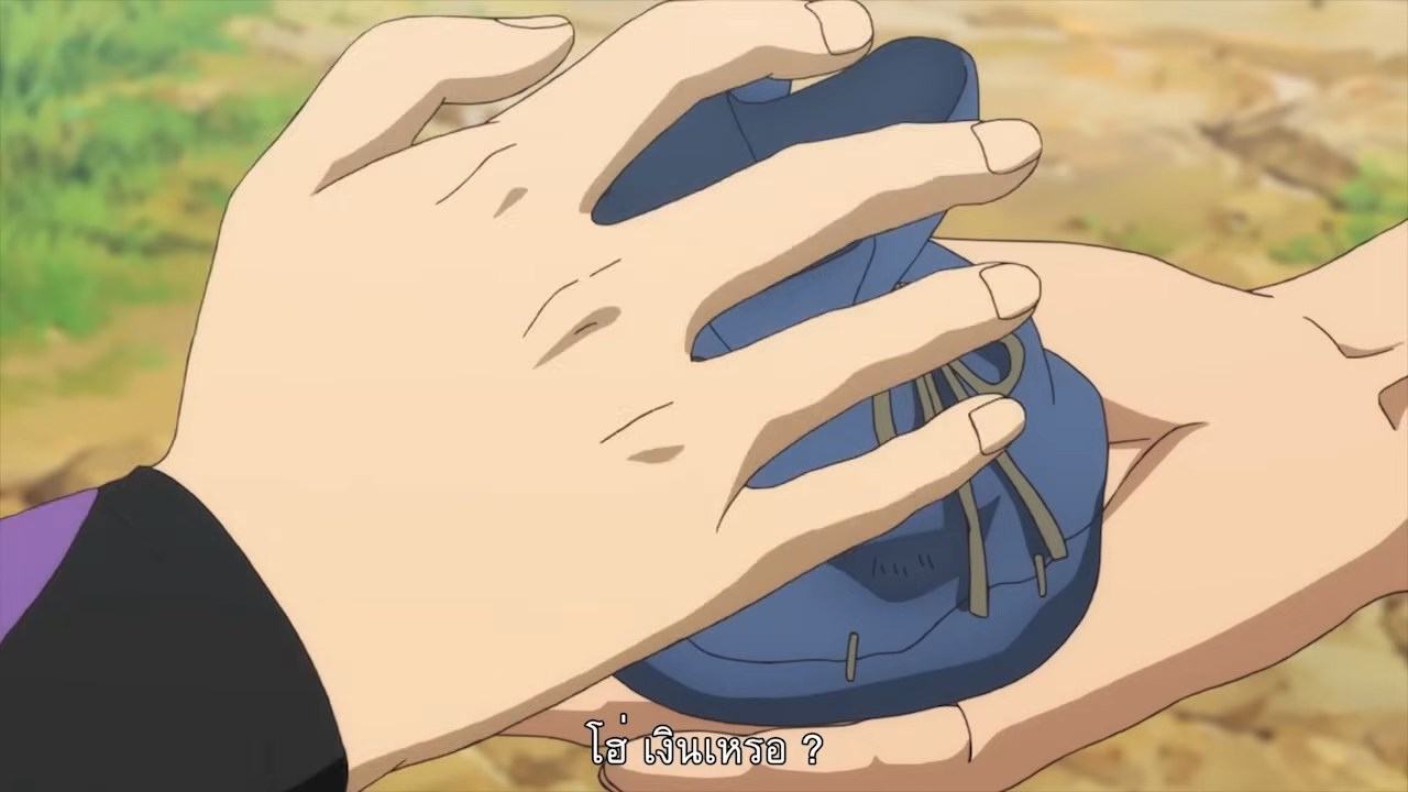 a closeup shot showing two hands exchanging a small blue pouch. the hand giving the pouch is fairskinned and belongs to a person wearing a dark purple sleeve. the receiving hand is also fairskinned. the background depicts a natural environment with brown dirt and patches of green grass, suggesting an outdoor setting. the overall lighting is bright and natural, casting soft shadows.  the presence of text in the image hints at a dialogue or interaction happening during this exchange.