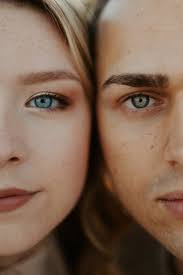 a closeup portrait of a couple, a woman with blonde hair