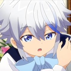 the image features a closeup illustration of a young anime boy with white hair and striking blue eyes. he's wearing a stylish outfit with a blue and white color scheme. his expression is a mix of surprise and curiosity, with his mouth slightly open. the background is softly lit, emphasizing the character's features.