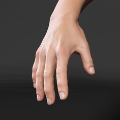 the image shows a closeup view of a righthand reaching down towards the ground. the image only shows the arm from just above the wrist. the hand is in focus, with a slightly blurred background. the lighting is soft and diffused. the overall color palette is warm and natural.