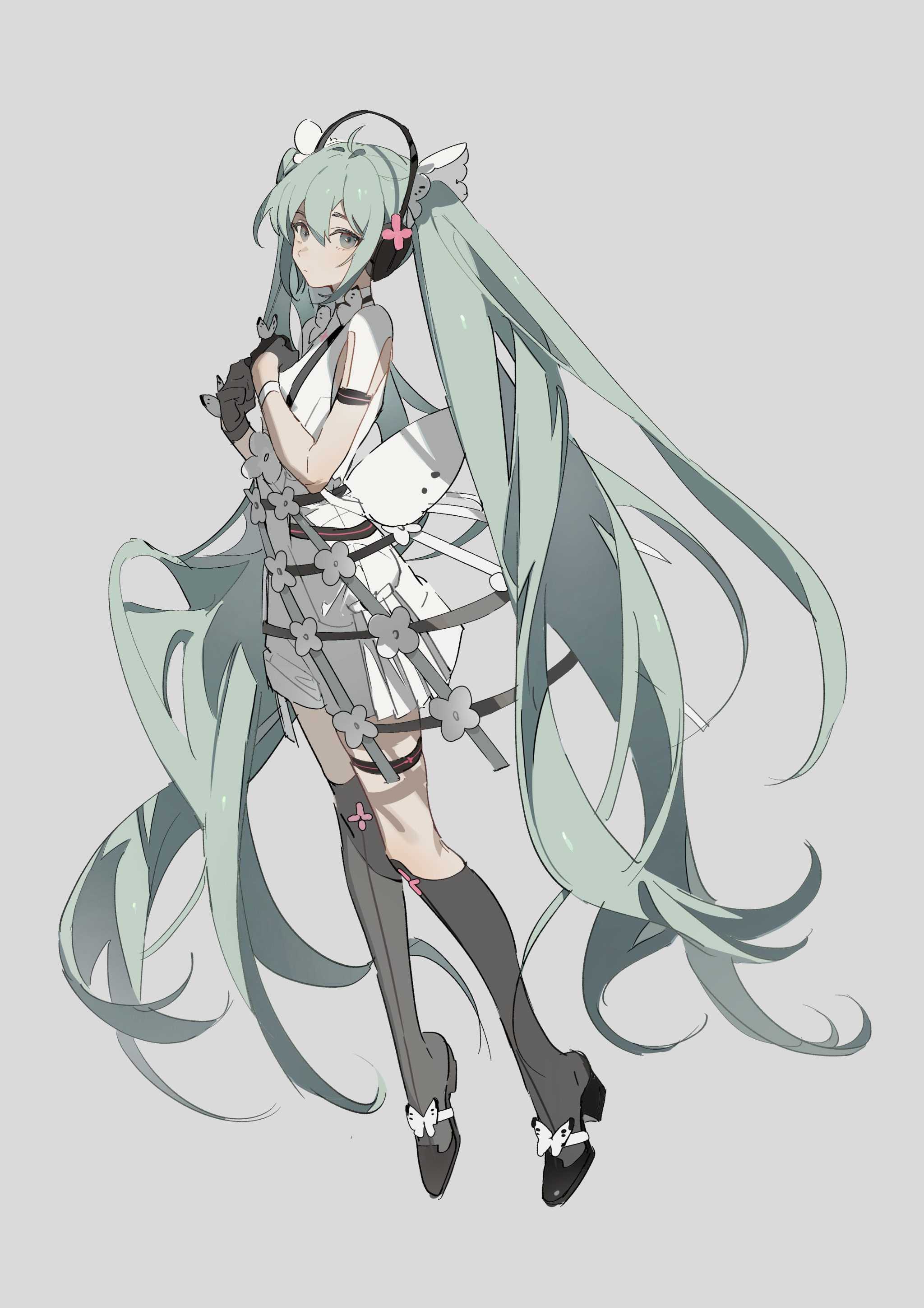 the image is a full body illustration of hatsune miku, a virtual singer. she has long, flowing green hair and is wearing a white dress with black and grey accents. the background is a solid grey color. she has headphones and butterfly accents on her dress and shoes.