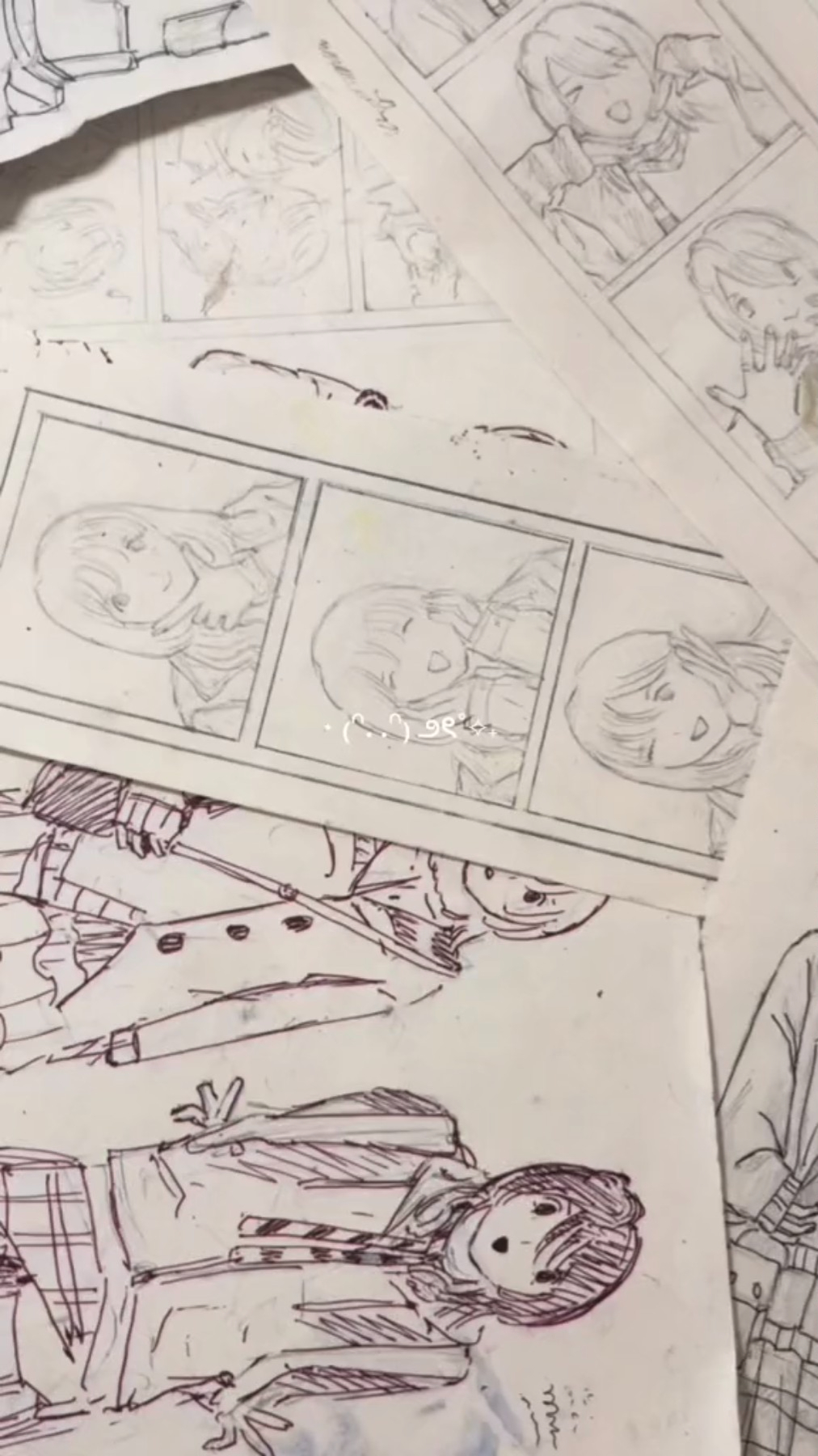 the image shows a collection of anime or mangastyle character sketches. the sketches are in various stages of completion, with some showing only basic shapes and others more detailed. the drawings are done in pencil on white paper.