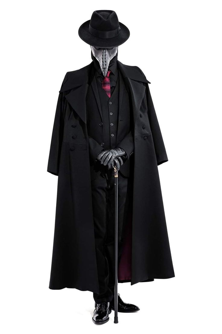 a man in a black suit, black coat, and black hat, with a long white mask is standing with his arms crossed, holding a cane. he is posed in a dramatic fashion, with the light hitting his face and the mask.  he is against a white background, which makes the black and white look more dramatic. the overall look is mysterious and elegant.
