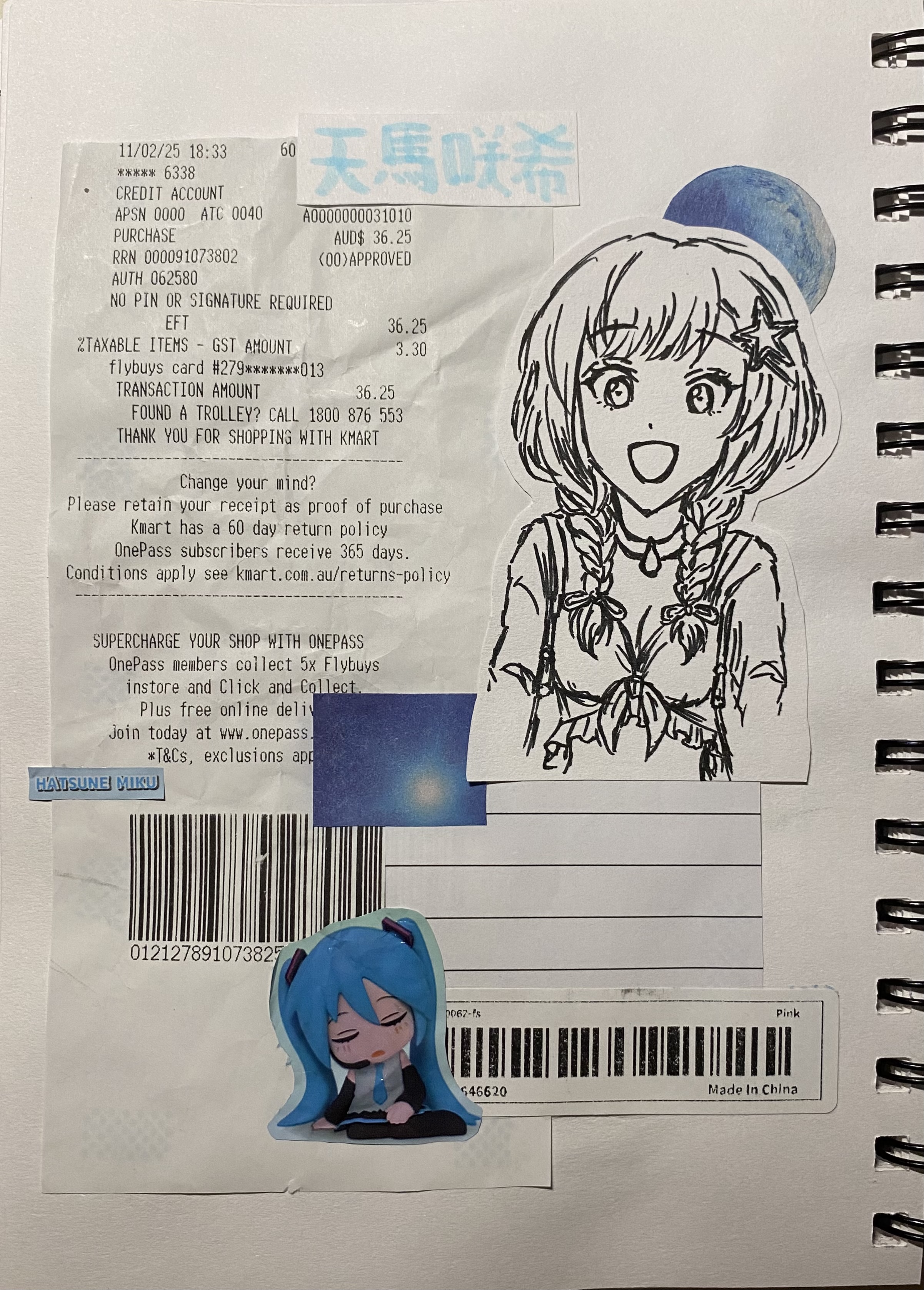 a notebook page with a kmart receipt, stickers of anime characters, a barcode label, and handwritten notes. the receipt details a purchase made on 11/02/25 at 18:33 with a flybuys card and mentions onepass benefits. the anime stickers include characters in a cartoon style. the handwritten notes are in japanese and related to character names.
