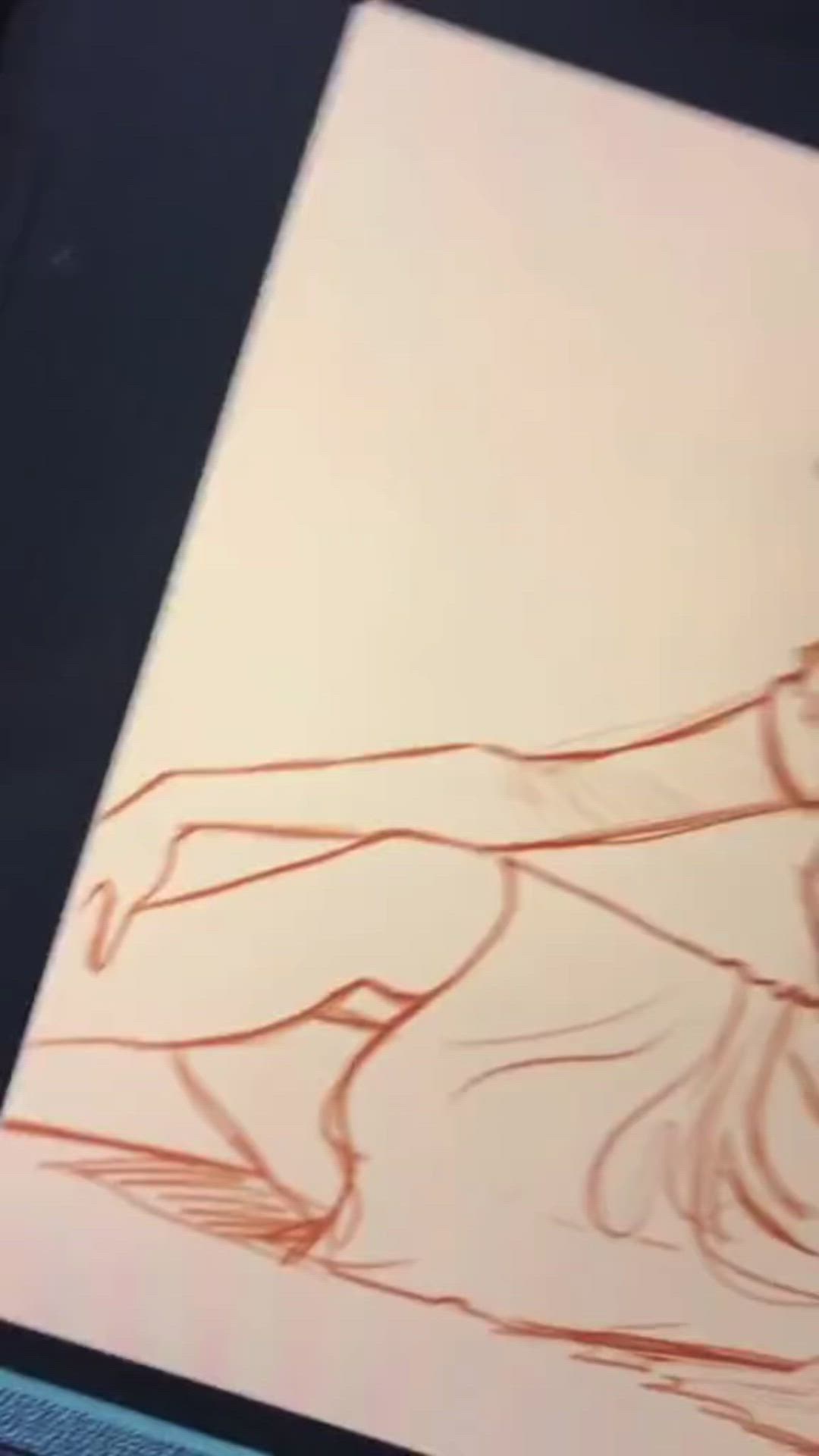 a rough drawing of a figure sitting in a relaxed pose, captured with a pencil on a white paper.