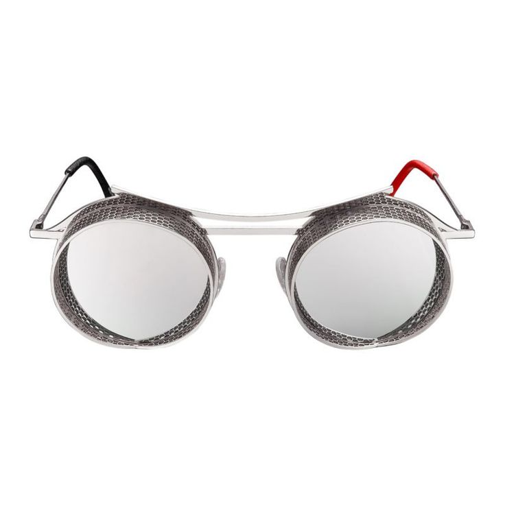 a pair of steampunkstyle sunglasses with round, reflective lenses and a detailed, hexagonal pattern on the metal frame. the frame is silver, and the earpieces have black and red accents. the sunglasses are isolated against a white background.