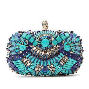 a beautiful blue and turquoise beaded clutch purse. the clutch is adorned with ornate jewels and embellishments. the clutch is perfect for evening wear.