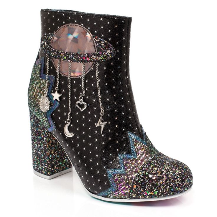 a black ankle boot with polka dots and a space theme. the boot has a glittering heel and toe, and a planet decoration with dangling charms.