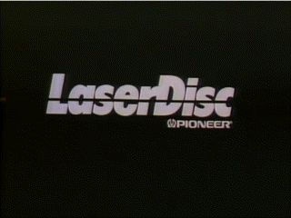the image shows the classic laserdisc logo, featuring the word "laserdisc" in a bold, white typeface, with a diagonal line through the "r". below the word "laserdisc", the word "pioneer" is printed in a smaller font, indicating the company that developed the technology. the background is a simple black.