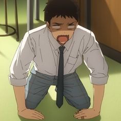 an anime drawing of a man with short dark hair and tan skin wearing a white buttondown shirt and blue jeans with a blue tie is kneeling on the floor with his mouth open as if he's yelling. the setting appears to be indoors, maybe a classroom. the walls and floor are pale green and the lighting looks like it's coming through a window offscreen.