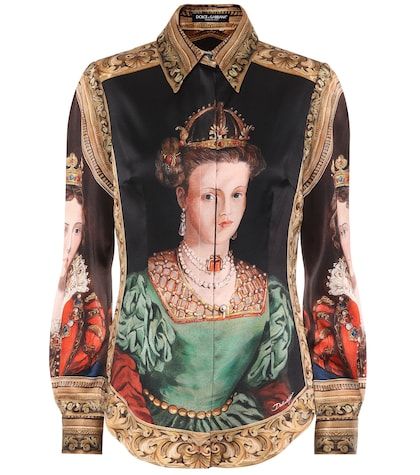 the image shows a buttonup shirt with a portrait of a queen printed on the front. the queen is wearing a crown and jewelry, and the shirt is decorated with baroque and renaissance designs.