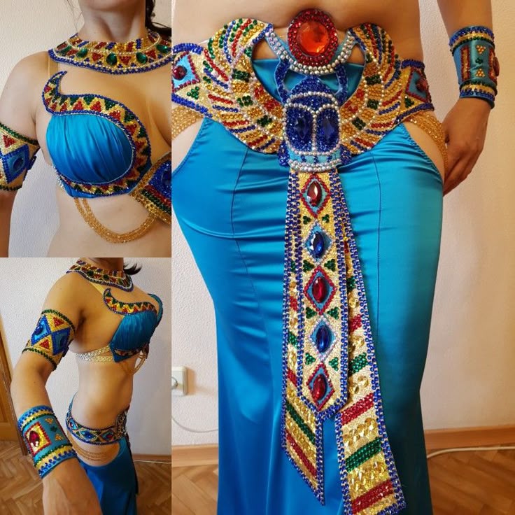 the image shows a woman wearing a detailed, blue egyptianstyle belly dance costume. the costume includes a beaded necklace, a blue bra, a beaded belt with a hanging decorative piece, a long blue skirt, and armbands. the costume is decorated with colorful beads and rhinestones.