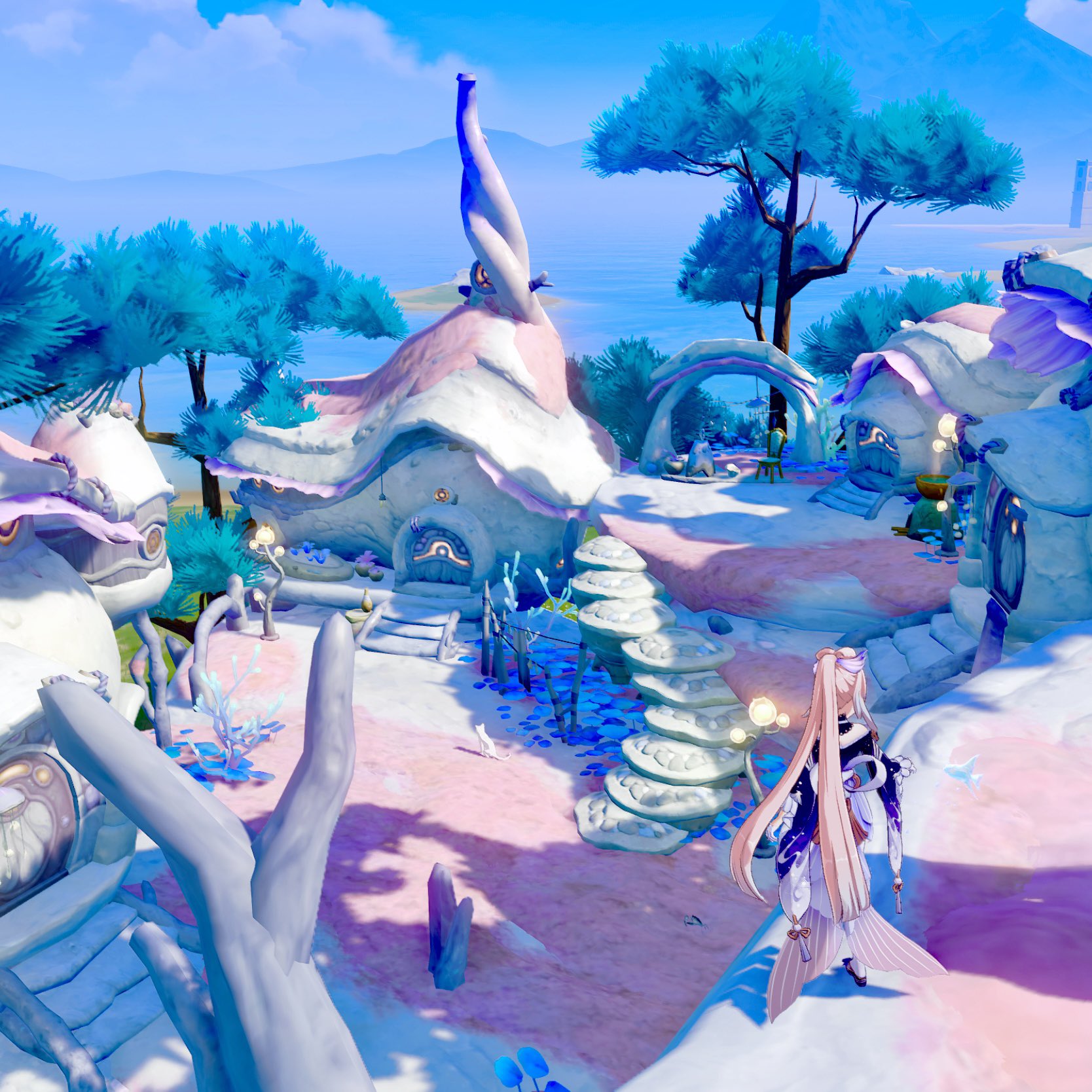 vibrant screenshot from the video game genshin impact depicts a whimsical village nestled on a pastelcolored landscape. the houses are unique, with soft, rounded shapes resembling mushroom caps, constructed from white and pink materials. pastel blue trees and other plants dot the area, giving the scene a surreal feel. a young female animestyle character with long pink hair stands in the foreground, gazing at the village. the overall tone is light, serene, and magical. the ocean and a clear, sunny sky complete the picturesque background.