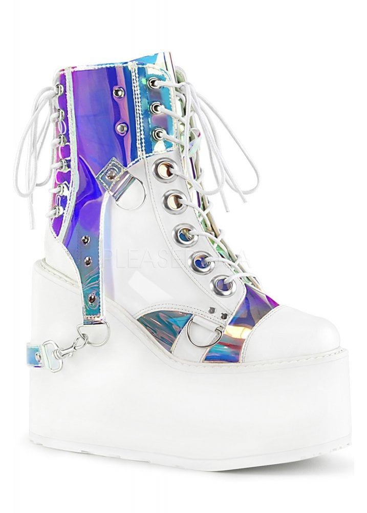 a closeup shot shows a pair of white platform boots with iridescent accents and laceup detailing, set against a white background. the boots feature a thick, white platform sole, a white upper with iridescent panels, and white laces threaded through silver eyelets. a decorative strap with a silver buckle and chain adorns the side of the boot. the overall style is trendy and eyecatching.