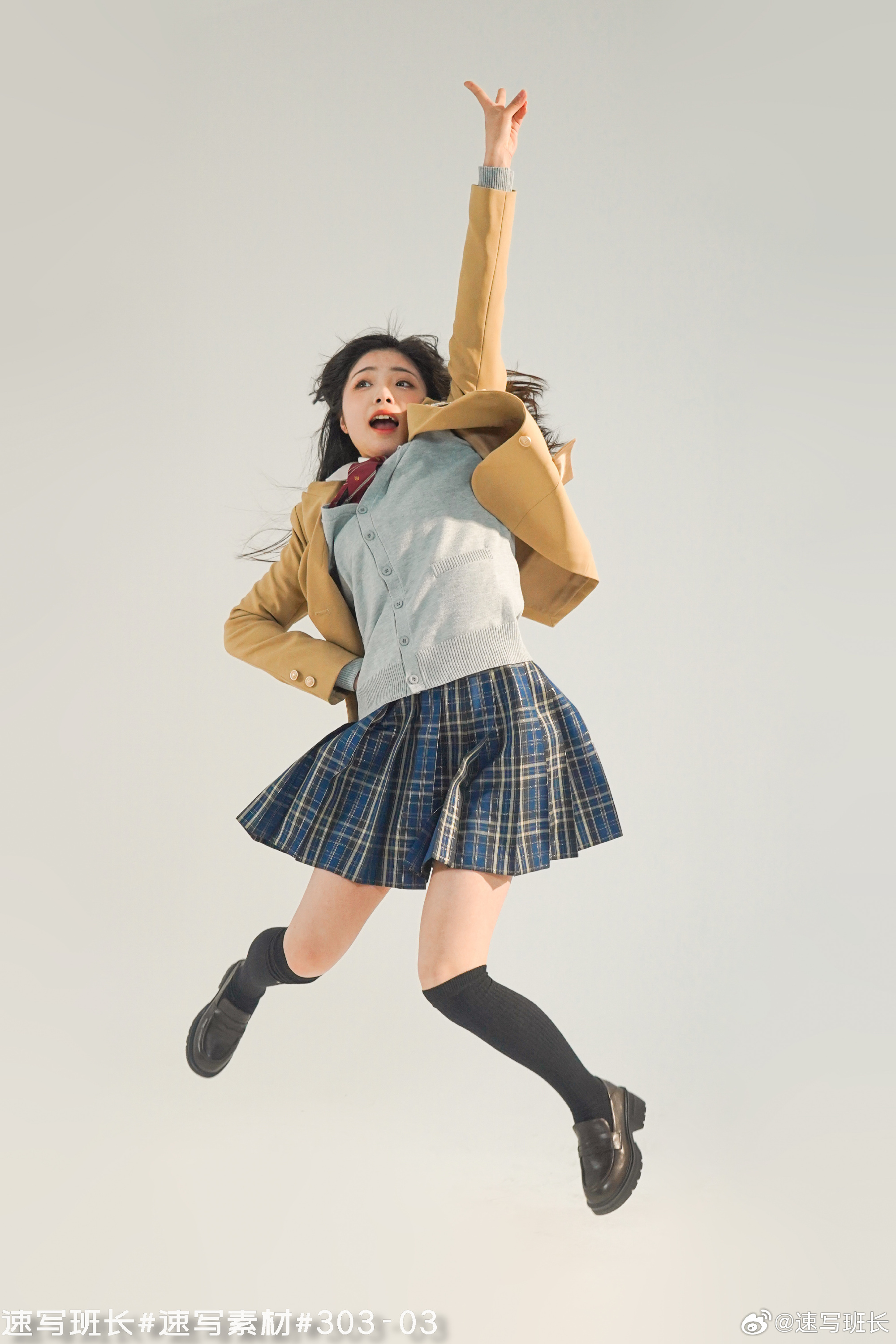 he image captures a young woman in a school uniform, exuberantly jumping midair against a minimalist white background. the low camera angle emphasizes her dynamic pose and joyful expression, while the soft lighting accentuates the youthful and energetic feel of the photo. she wears a classic school uniform composed of a plaid skirt, white blouse, and yellow blazer. her black kneehigh socks and loafers complete the look. the overall image conveys a sense of cheerfulness, freedom, and youthful spirit.