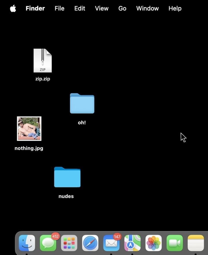 the image is a screenshot of a macos desktop with several files and folders visible. there's a zip file named "zip.zip," a jpg file named "nothing.jpg" that contains an image of a person, and two folders named "oh!" and "nudes." the macos menu bar is visible at the top, and the dock is at the bottom with various application icons. the image also contains a cursor in the upper right of the image.