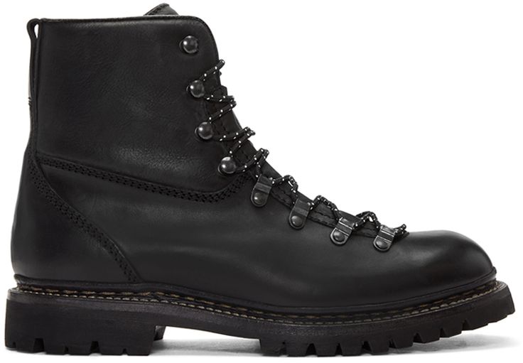 a pair of black leather hiking boots with a laceup closure. the boots are made of highquality leather and have a durable rubber sole. they are perfect for hiking, camping, or any outdoor activity. the boots are also stylish enough to wear casually.