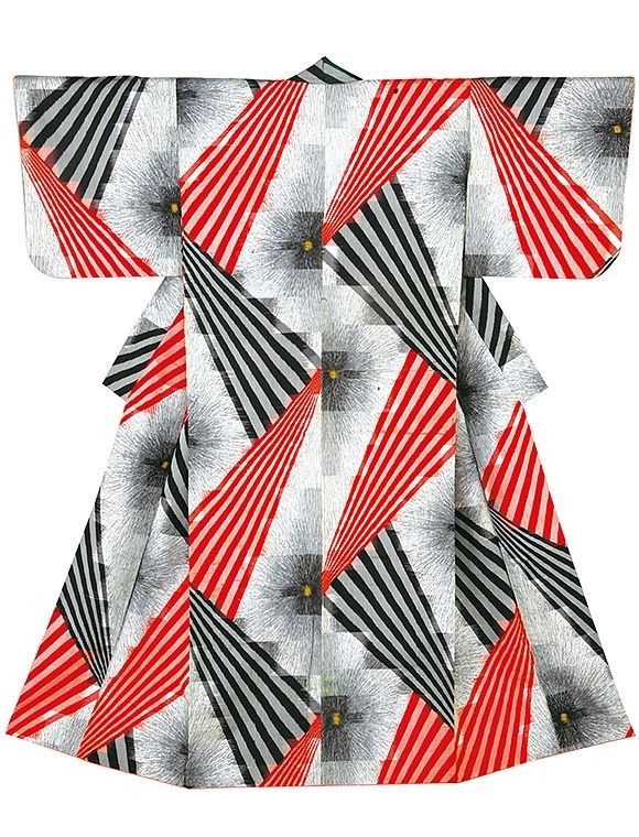 a traditional japanese kimono with a red, black, and white geometric pattern. the kimono is made of a lightweight fabric and features a bold and abstract design. the kimono is a beautiful and elegant piece of clothing that is perfect for special occasions.  the design is similar to a "kiku" or chrysanthemum pattern.