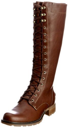 a pair of brown leather laceup boots are shown against a white background. the boots are tall, reaching above the ankle, and have a chunky heel. the laces are tied in a crisscross pattern and there are brass colored eyelets along the laces.  the boots appear to be made of highquality leather.