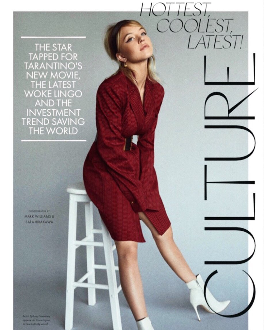 a magazine cover featuring a young woman, possibly actress sydney sweeney, in a red dress and white boots. she is sitting on a stool and looking at the camera. the cover features the title "culture" with the subtitle "hottest, coolest, latest!"  there is text about her role in a tarantino movie, woke lingo, and an investment trend. the photography credits are also given. the overall aesthetic is stylish and modern.