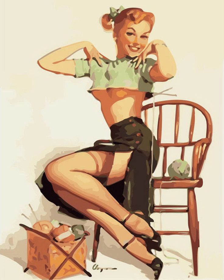 a pinup girl with red hair sits on a chair knitting. she's wearing a green top and a black skirt and heels. her legs are crossed and she looks like she's thinking about something. she's sitting next to a basket of yarn.