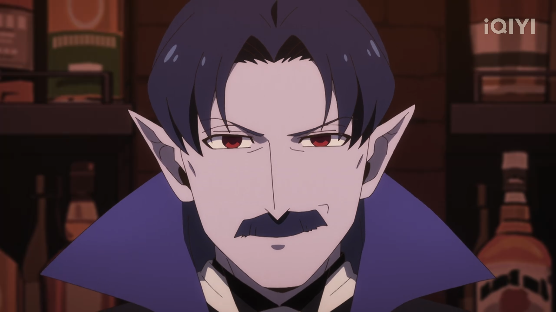 the image shows a close up shot of an anime style male character with pale blue skin and black hair with blue highlights. the character has red eyes, pointed ears, and a mustache. he is wearing a dark blue collared shirt with a white undershirt and a blue jacket. he is in a place with shelves in the background.