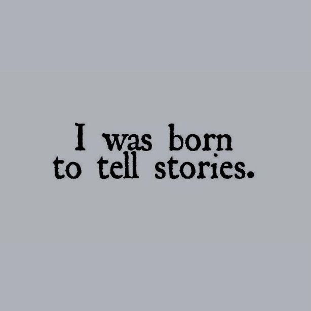 the image shows the quote "i was born to tell stories" written in black, typewriterstyle font against a gray background.