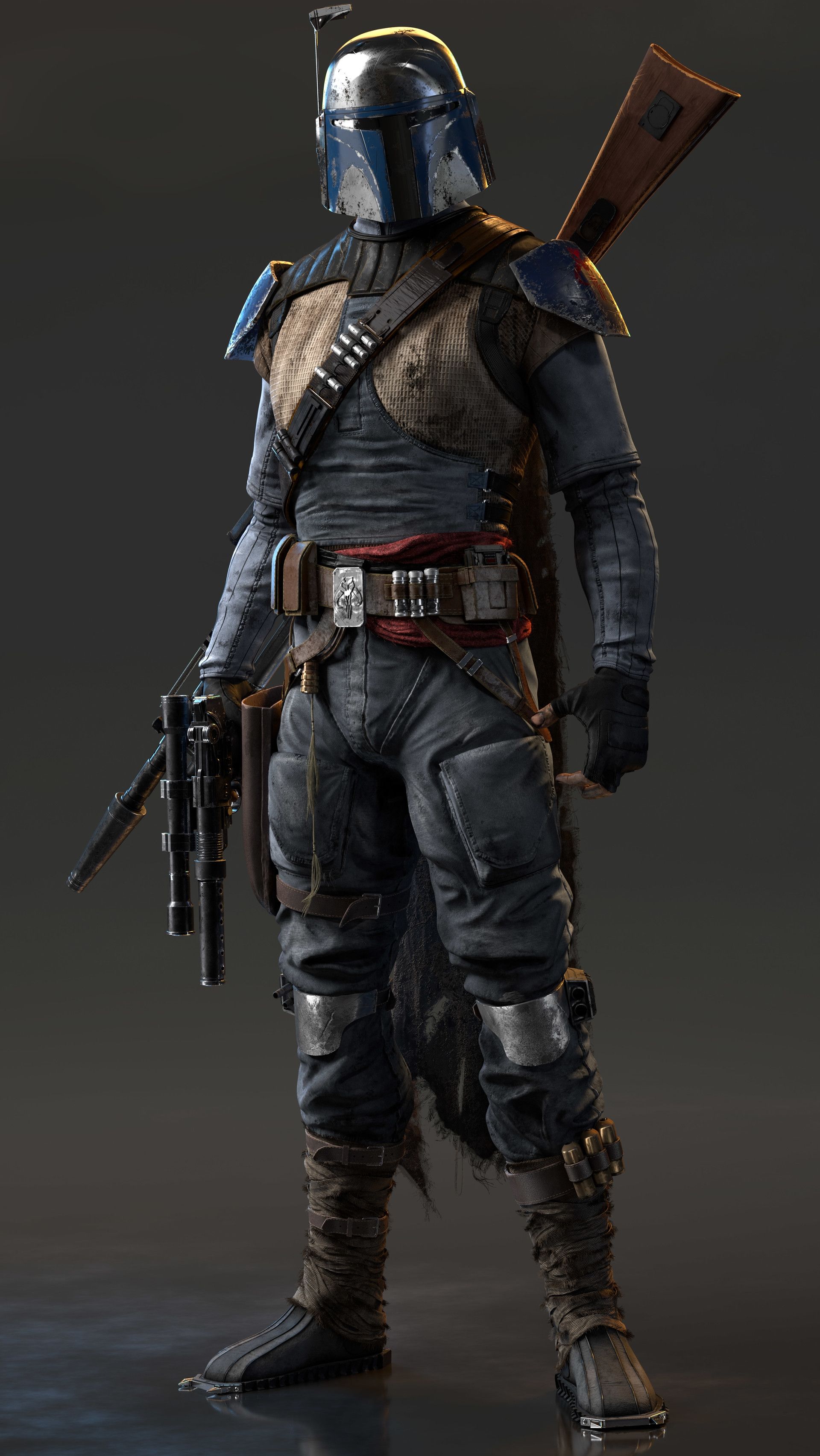 a closeup image of a star wars mandalorian, boba fett, standing with his signature jetpack, gun, and helmet.
