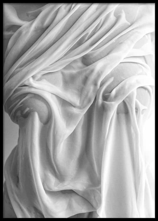 a closeup of a white, sheer fabric draped over a body. the fabric is smooth and soft, with gentle folds and wrinkles creating a delicate texture. the light shines through the fabric, creating a sense of lightness and airiness.