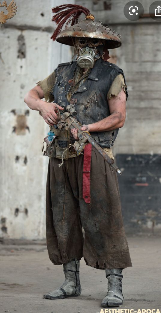 the image shows a person in a detailed postapocalyptic cosplay costume.  the costume includes a widebrimmed, rusty hat with decorative spikes, a gas mask, a tattered vest, dirty pants, and worn footwear resembling tabi boots. the person carries a long rifle and has a weathered, worn appearance consistent with a dystopian or wasteland setting. the background is a gritty, urbandecay environment adding to the overall postapocalyptic theme. the overall aesthetic is gritty, detailed, and effectively captures the spirit of postapocalyptic survival.