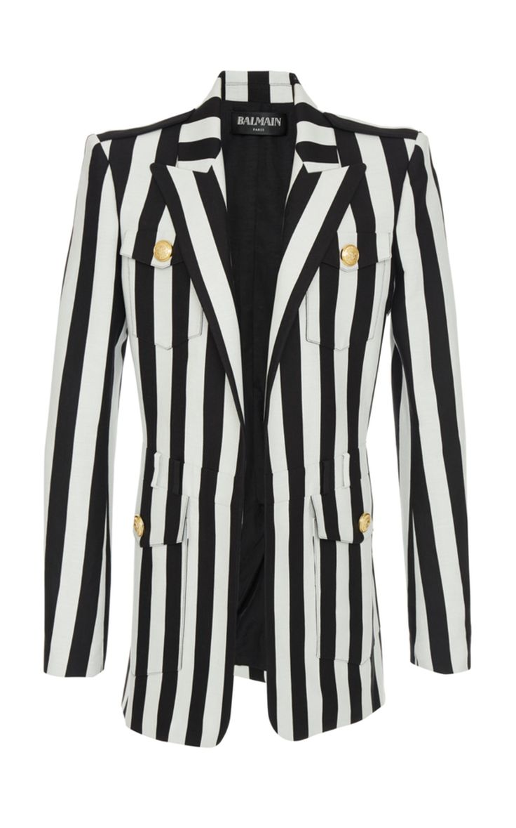 a black and white striped balmain blazer with gold buttons.