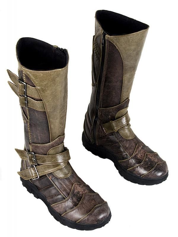 a pair of brown and green leather kneehigh boots with buckles and straps. the boots have a side zipper and a rugged outsole. they appear to be combat boots.