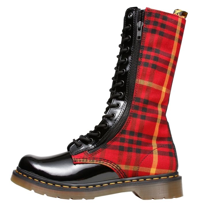 a red and black plaid combat boot with black laces and a black, glossy cap toe, shown against a white background. the boot has a zipper down the side and the upper portion of the boot is made of a red and black plaid fabric. the sole is brown.