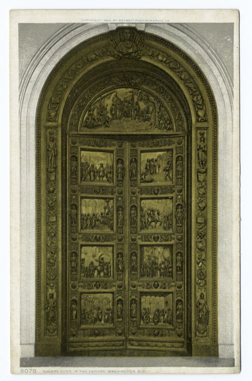 a vintage image of the rogers door at the capitol in washington d.c. the door is highly decorated with relief carvings and is set within a large arched opening. the image is credited to detroit photographic co. and copyrighted in 1904.