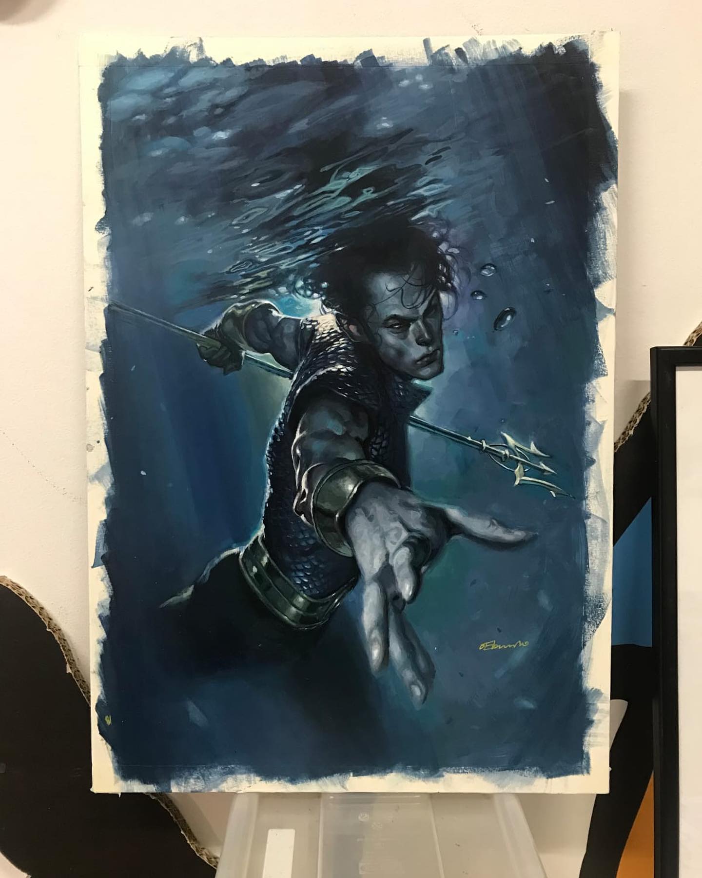 a painting of a superhero, possibly aquaman or namor, swimming underwater and holding a trident. he is looking towards the viewer with his hand outstretched, as if reaching out. the painting has a comic book art style with a focus on dramatic lighting and realistic textures. the surrounding water is a deep blue with some light rays filtering through.