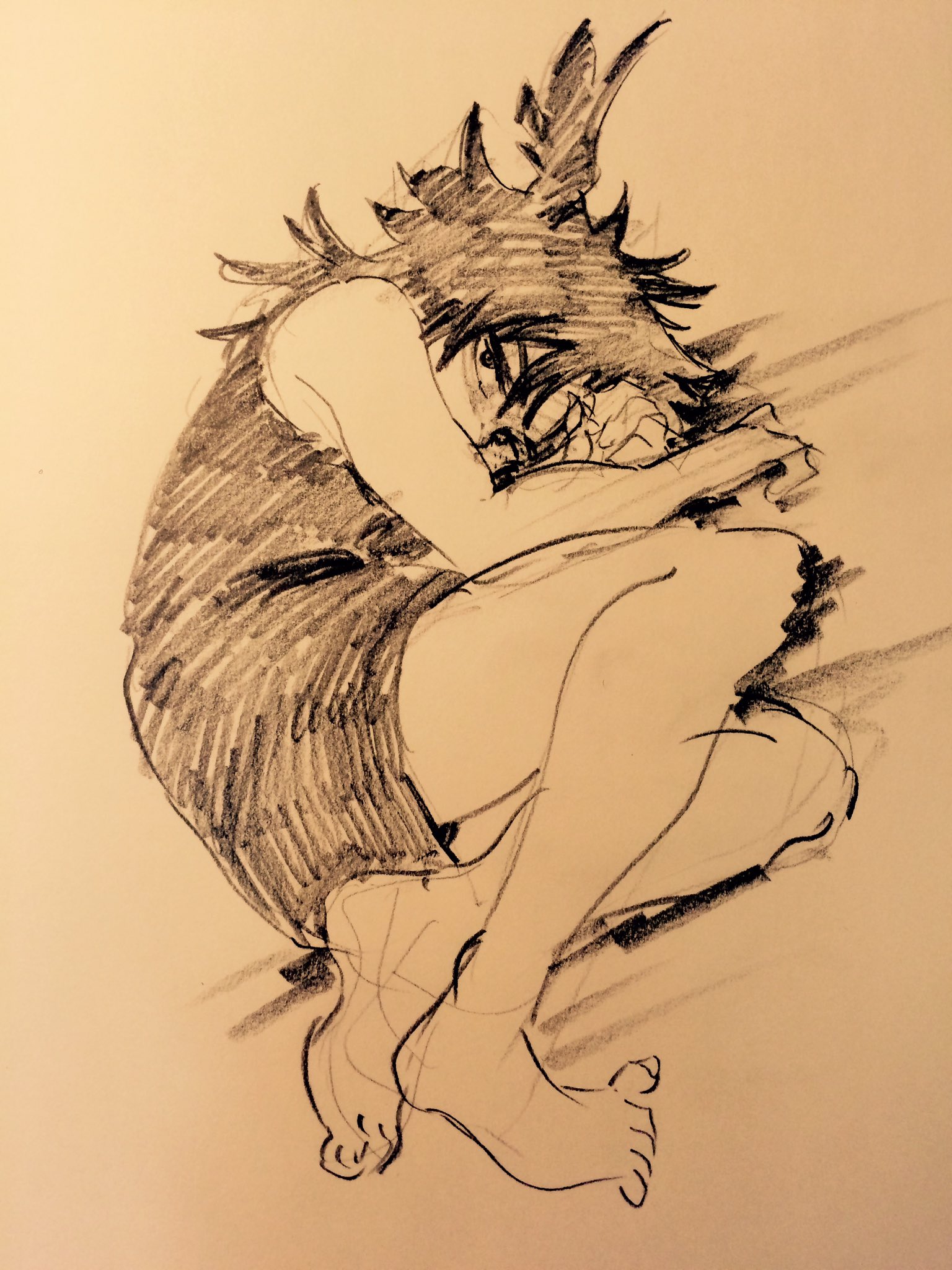 this black and white sketch shows a single person curled up, asleep or trying to sleep. their hair is spiky and their knees are drawn up to their chest. the person is wearing a tank top and shorts, and they appear to be laying on a thin mattress or blanket.