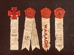 the image shows four parchment scrolls with wax seals, each representing a different faction from the warhammer 40k universe. the factions are, from left to right: black templars, death guard, space wolves, and orks.