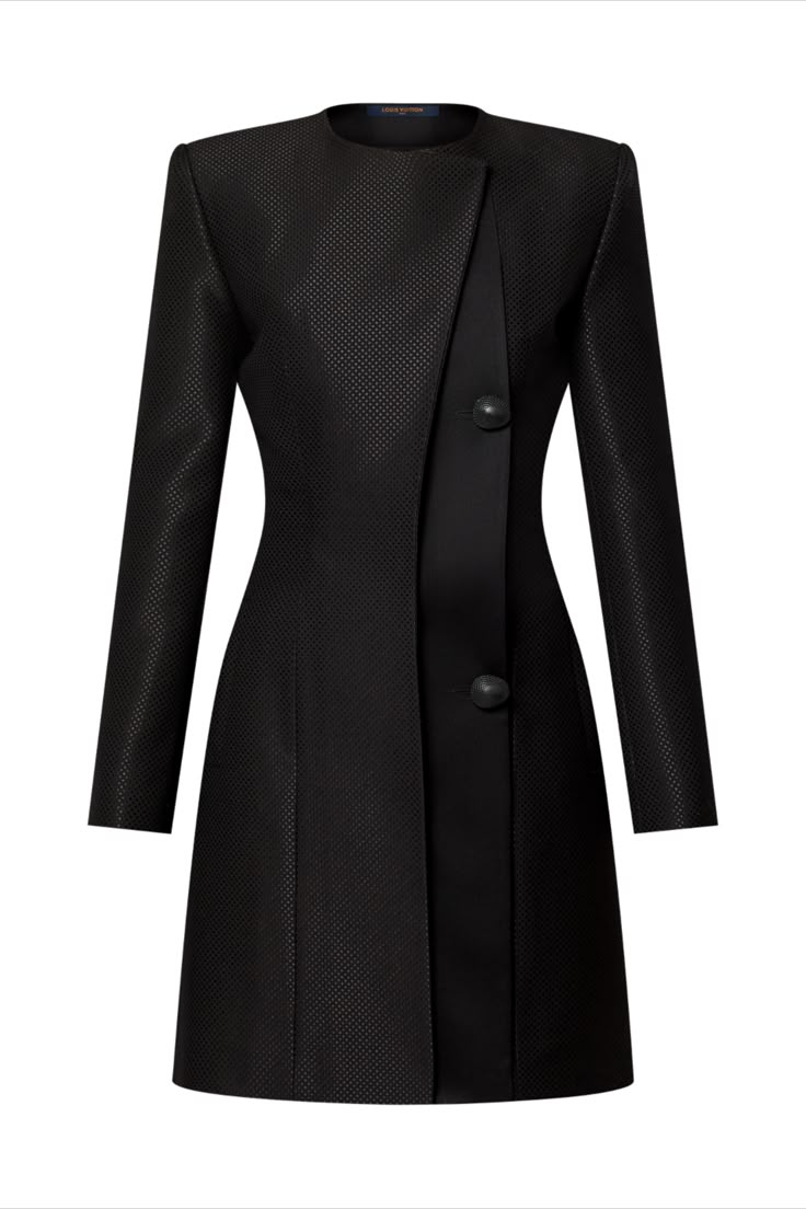 a black, longsleeved coatdress is displayed against a white background. the garment features a textured fabric with a visible weave pattern. it has an asymmetrical front closure with two buttons and a contrasting smooth panel running vertically along the front. the coat has a fitted silhouette, highlighting the waist, and extends to just above the knee. the design is sleek and modern.