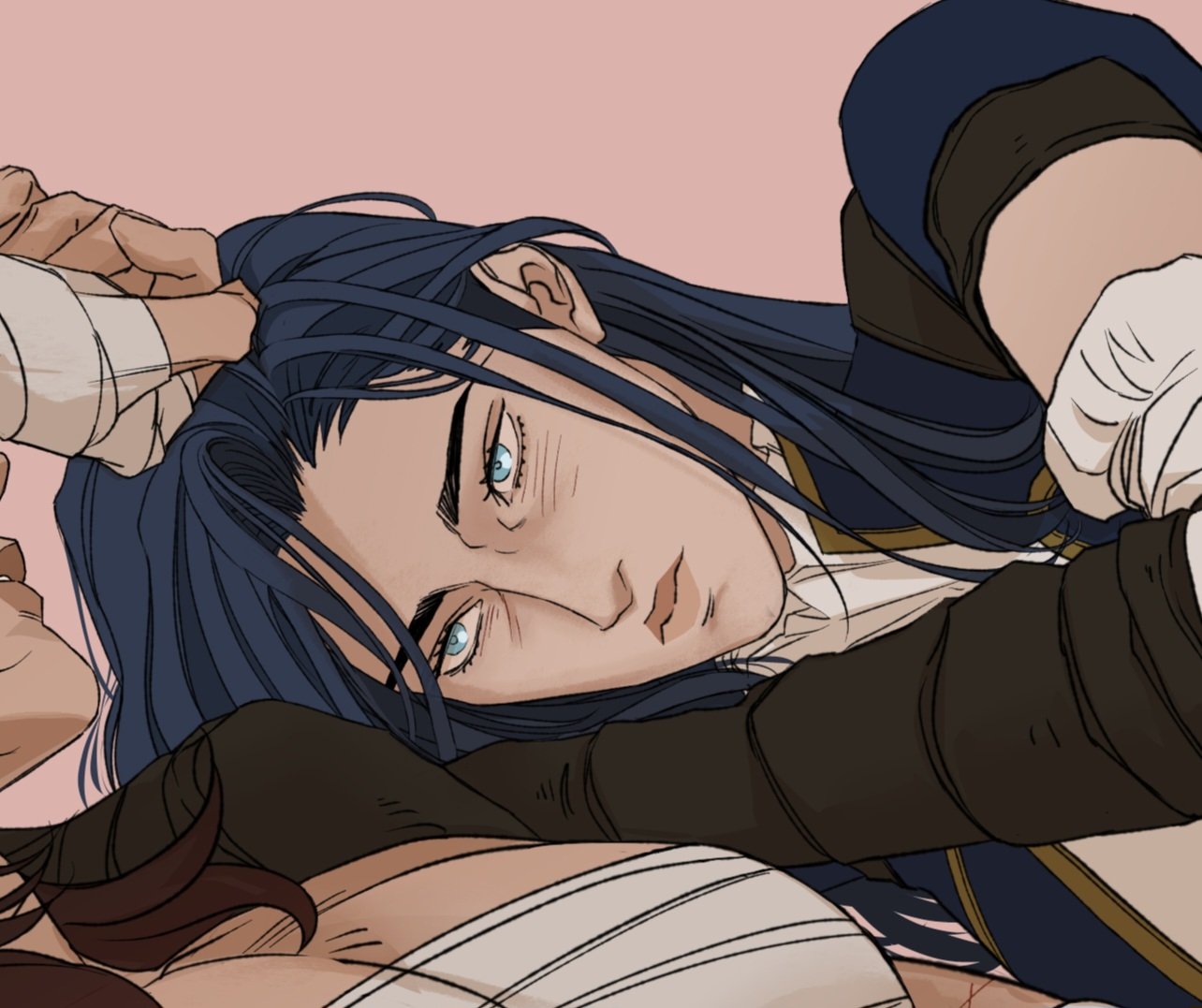 the image is an animestyle illustration featuring two male figures in a relaxed, intimate pose. one figure, with long blue hair and striking blue eyes, is lying down and looking towards the viewer with a slightly stern expression. he has fair skin and is wearing a dark brown or black garment with some white underneath. his hand, wrapped in bandages, is near his head. the second figure, partially visible beneath the first, appears to be similarly injured with bandages and has darker skin. they are lying against a plain light pink background. the overall style suggests a webtoon or manga influence.